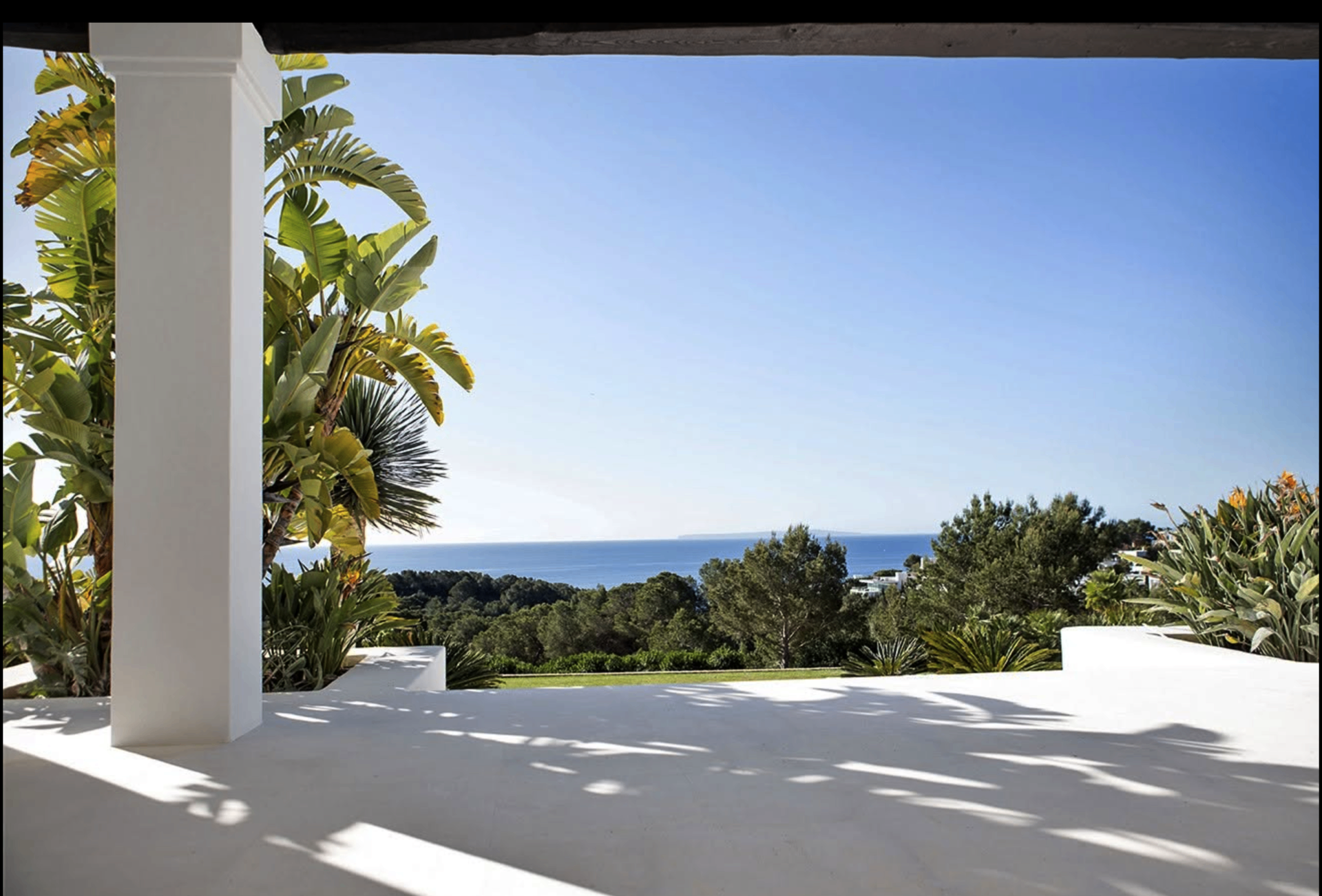 Mediterranean stone villa courtyard at golden hour